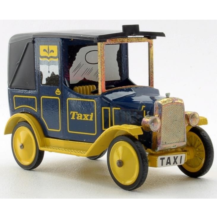 A toy antique taxicab